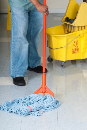 Breezie Cleaning and Janitorial Services janitor in Riverside, MA mopping floor.